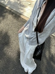 色の偽の2つのニットのカーディガンの婦人服の秋の長袖のセーターのコートのデザイン感の灰色の復古的な韓系の上着