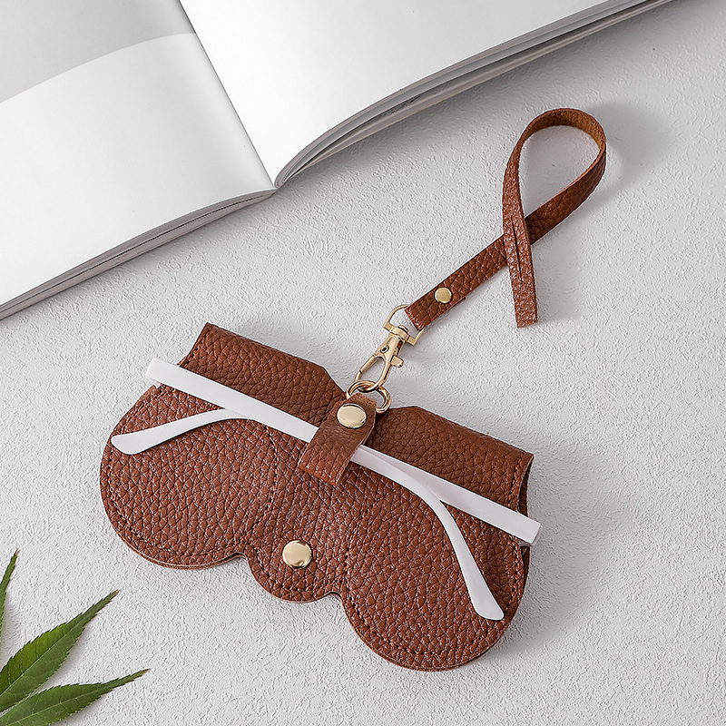 Nuevo paquete de gafas de sol portátiles bolsa de almacenamiento de gafas de sol estuche de gafas con patrón de lichi cuello colgante gafas de cuero cubierta protectora