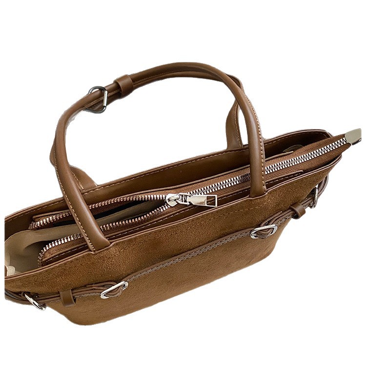 Otoño y invierno retro gamuz de hombro bolso de brazo para mujeres de viaje versátil bolso de mano simple 2025 nuevo bolso