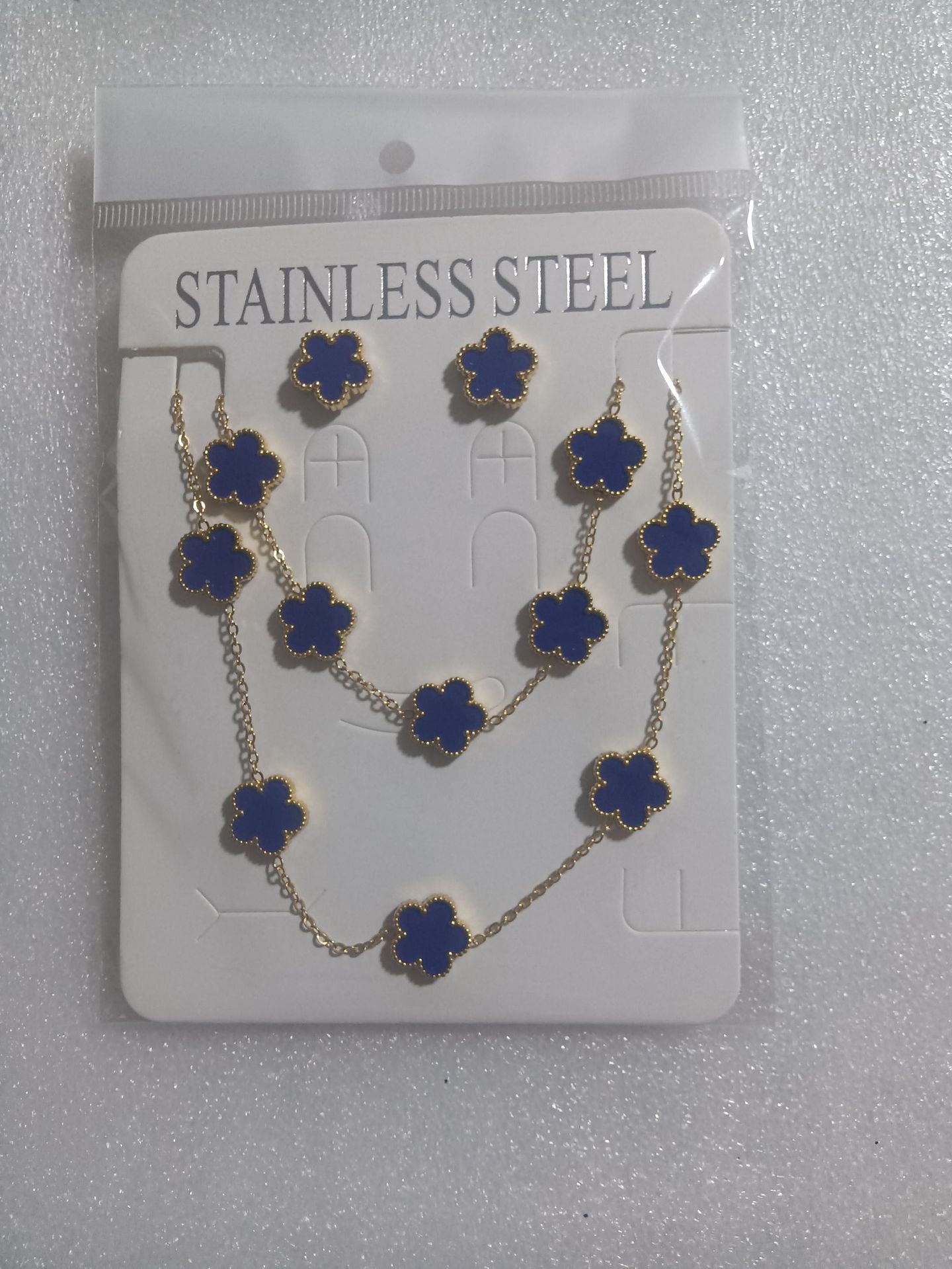 Trébol de cinco hojas de la suerte nuevo estilo transfronterizo pulsera de acero de titanio de doble cara, collar, aretes, moda de nicho de 18K, no se desvanece