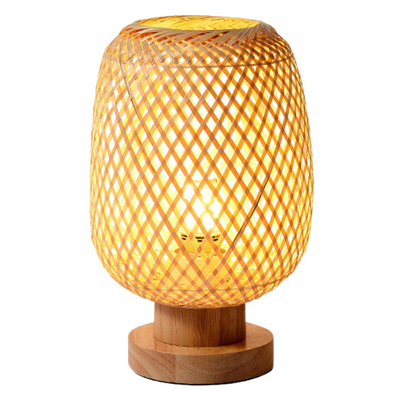 Pequeña lámpara de mesa lámpara de estilo japonés Typhoon dormitorio lámpara de noche ins chica Retro Decoración del hogar creativo lámpara tejida de Bambú