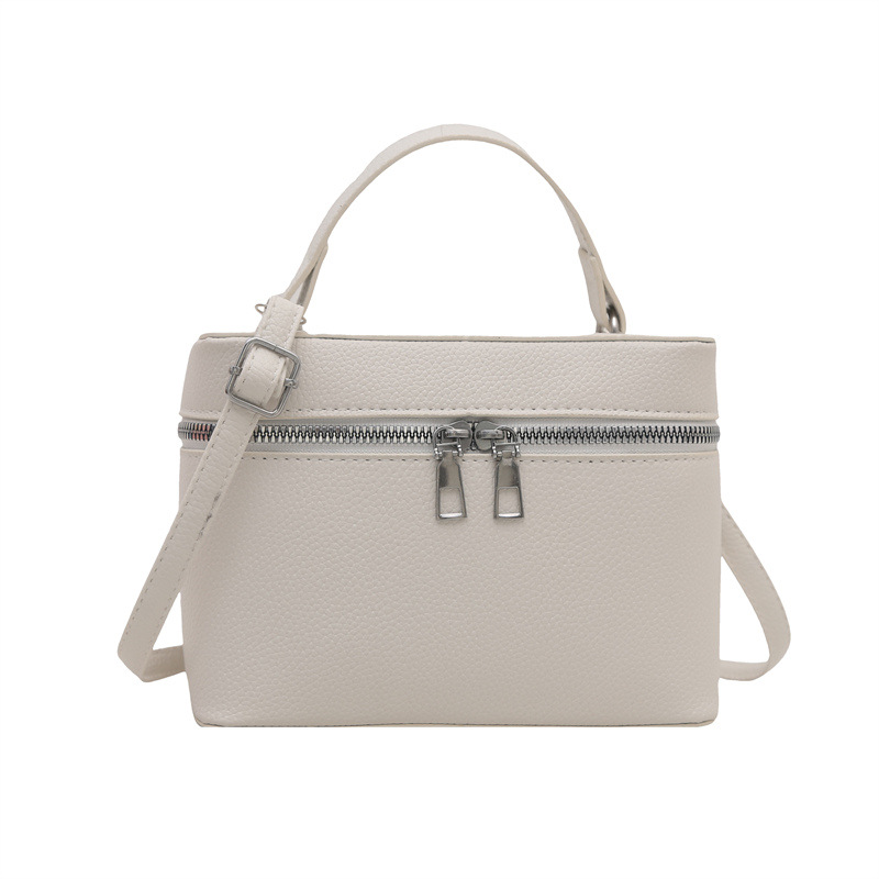 Bolsos para mujer nuevo estilo 2025 primavera nicho todo-fósforo bolso de mensajero de moda de hombro patrón de lichi bolso de cubo de lujo ligero