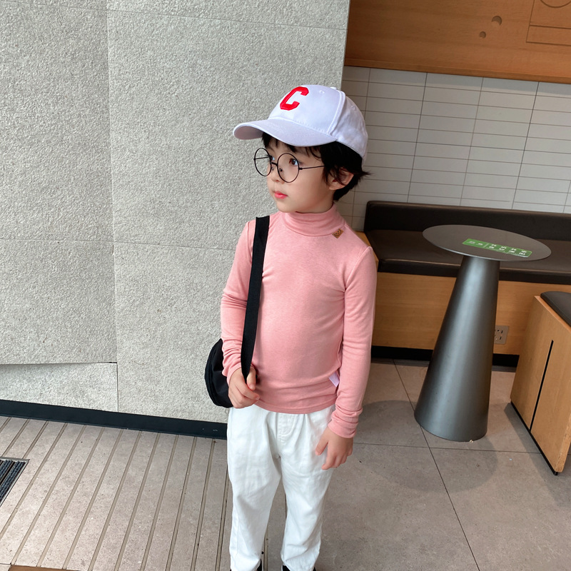 Ropa de otoño e invierno para niños nuevo estilo coreano color sólido camiseta de los muchachos medio cuello alto camisa de fondo para niñas engrosada bebé manga larga superior