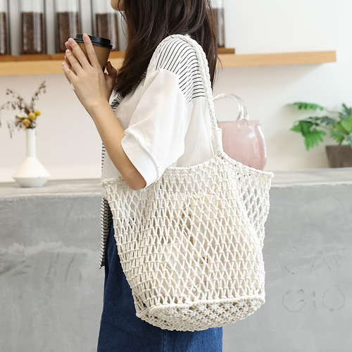 Korean style casual literary bucket bag ins fashion hollow canvas mother-in-law bag internet celebrity cotton thread woven shoulder bag for women