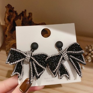 Aguja de plata Pendientes de lazo de diamantes coreanos Pendientes de temperamento de moda de todo fósforo Pendientes de diseño de nicho Sentido de lujo ligero