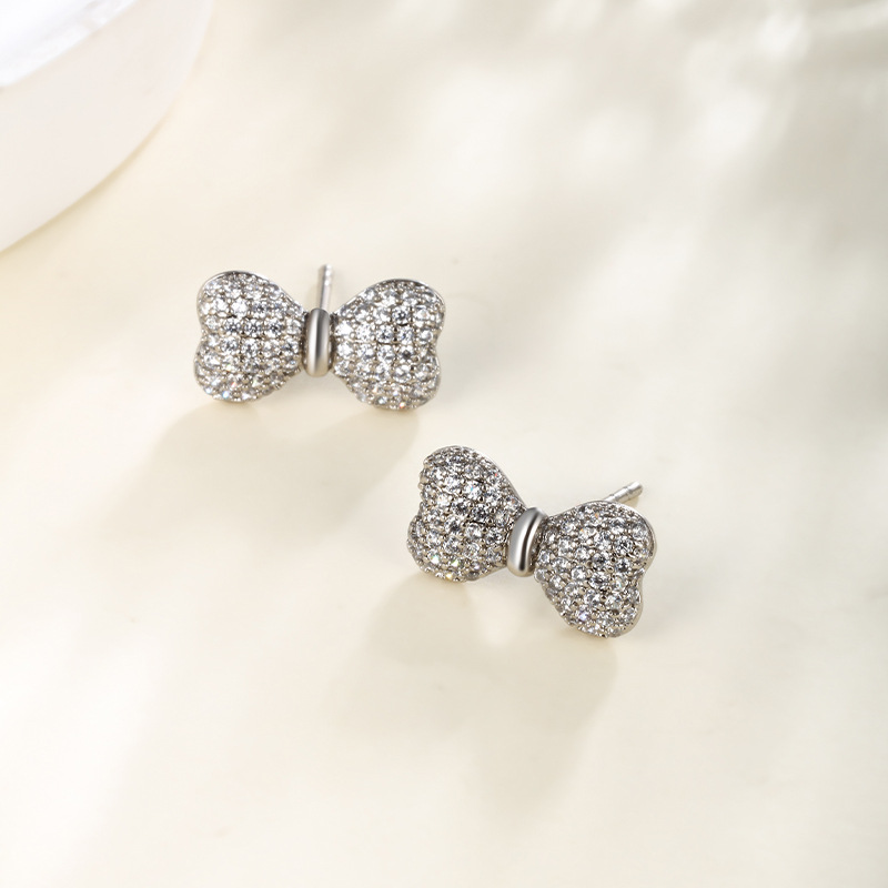 Xuping joyería exquisita arco de diamante completo orejetas mujeres verano dulce lindo viento hermoso pernos de orejas nicho sentido de alta calidad