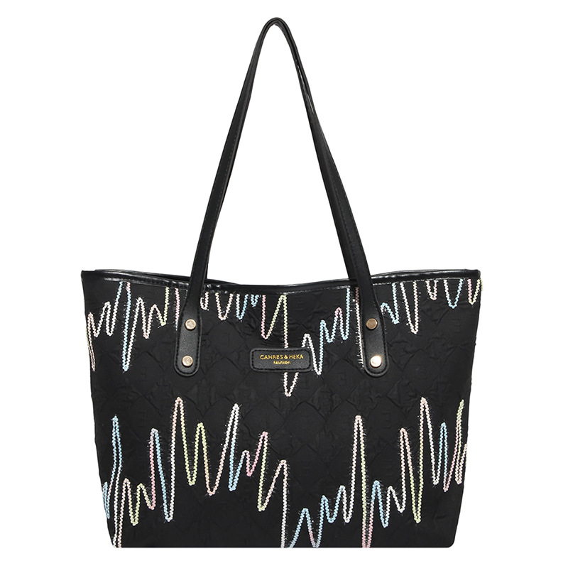 Bolsas de tela de clase de estudiantes para mujeres 2025 nuevo hombro brazalete estriado de gran capacidad de viaje ocio bolsa de mano