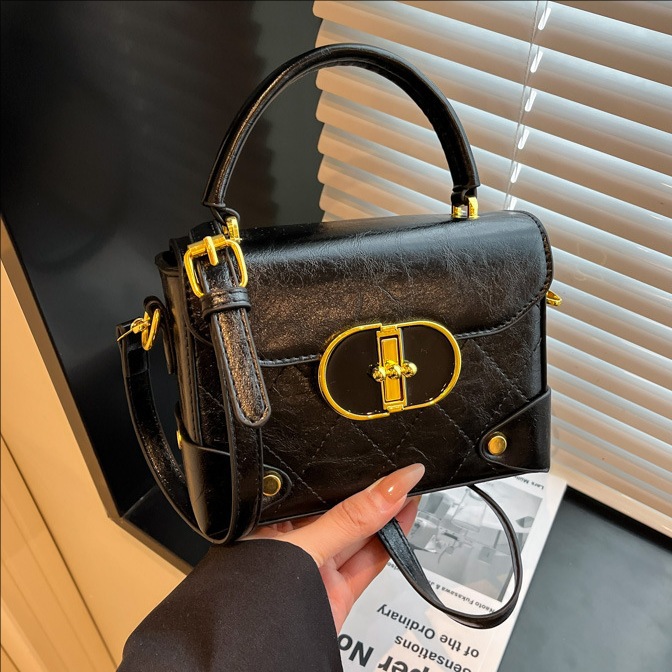 Bolso de mano super caliente para mujeres otoño invierno 2025 nuevo retro versátil bolso de hombro coreano bolso de mochila pequeña