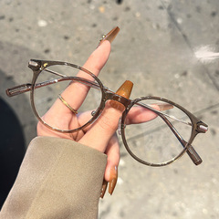 No-makeup-style brown glasses with ultra-lightweight TR frames, model 8140—anti-blue light, Danyang-inspired trendy eyewear frame available for wholesale; perfect for women's myopia glasses.