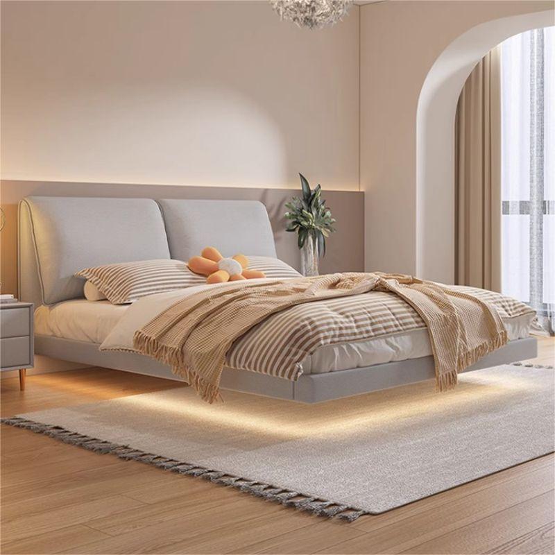 Italiano minimalista suspendido orejas de elefante moderno minimalista cama de cuero real dormitorio principal Luz de lujo abajo bolsa suave cama doble con luz