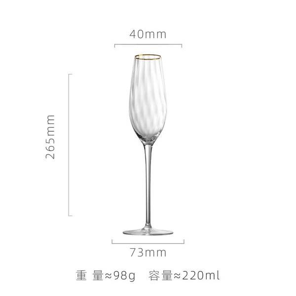 Gold rimmed champagne glass