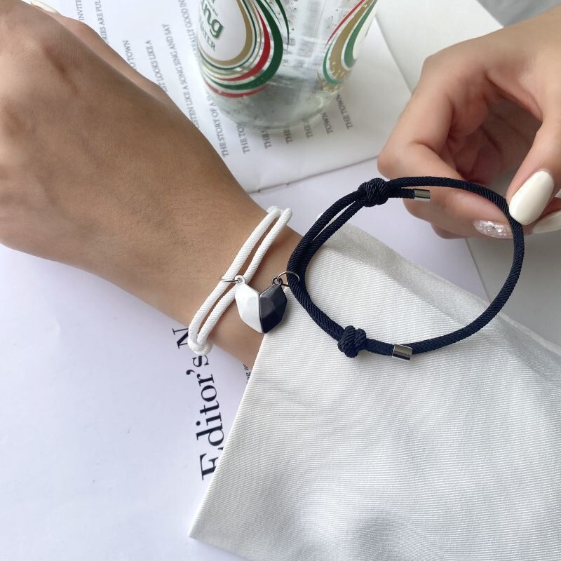European and American cross-border new heart-shaped magnet suction couple bracelet black and white hand-holding wishing stone magnetic suction stone bracelet wholesale