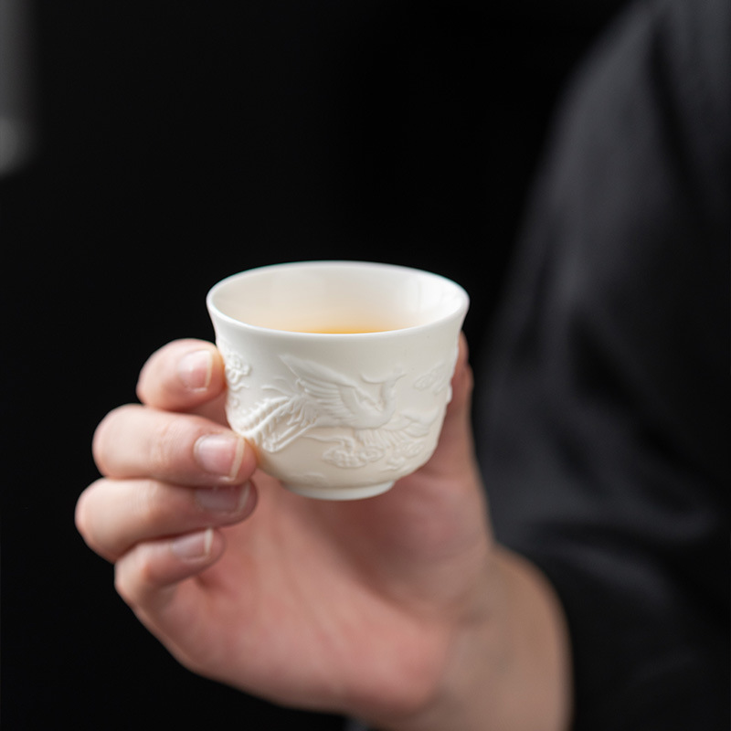 Sheep fat jade white porcelain embossed tea cup Master Cup Dragon and Phoenix Tea Cup personal single cup plain burning kung fu ceramic handmade tea