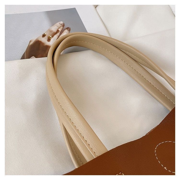 2024 New Bags Korean Version Versatile Commuting Bags Large Capacity Portable Tote Bag Temperament Popular Women’s Bag Vertical Style_voghion.com