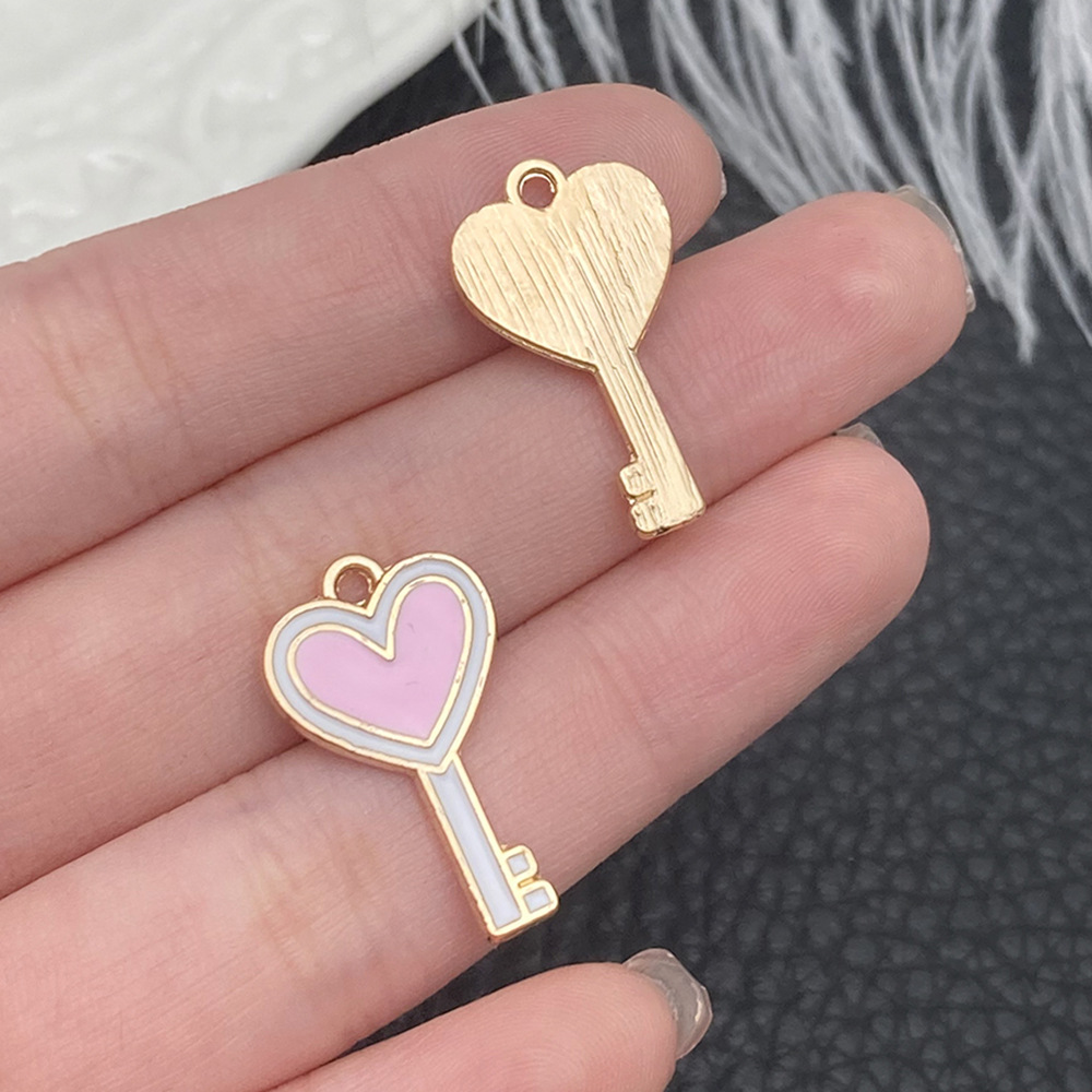 1 clave rosa en forma de corazón de nectarina 13x22mm - 12310 - 1,2g