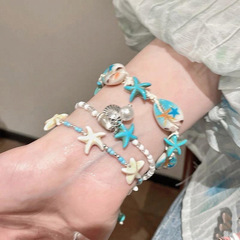 海辺の休暇ブルーシェルヒトデブレスレット女性の休暇スタイルビーズブレスレット 2025 新しいスタッカブルブレスレット