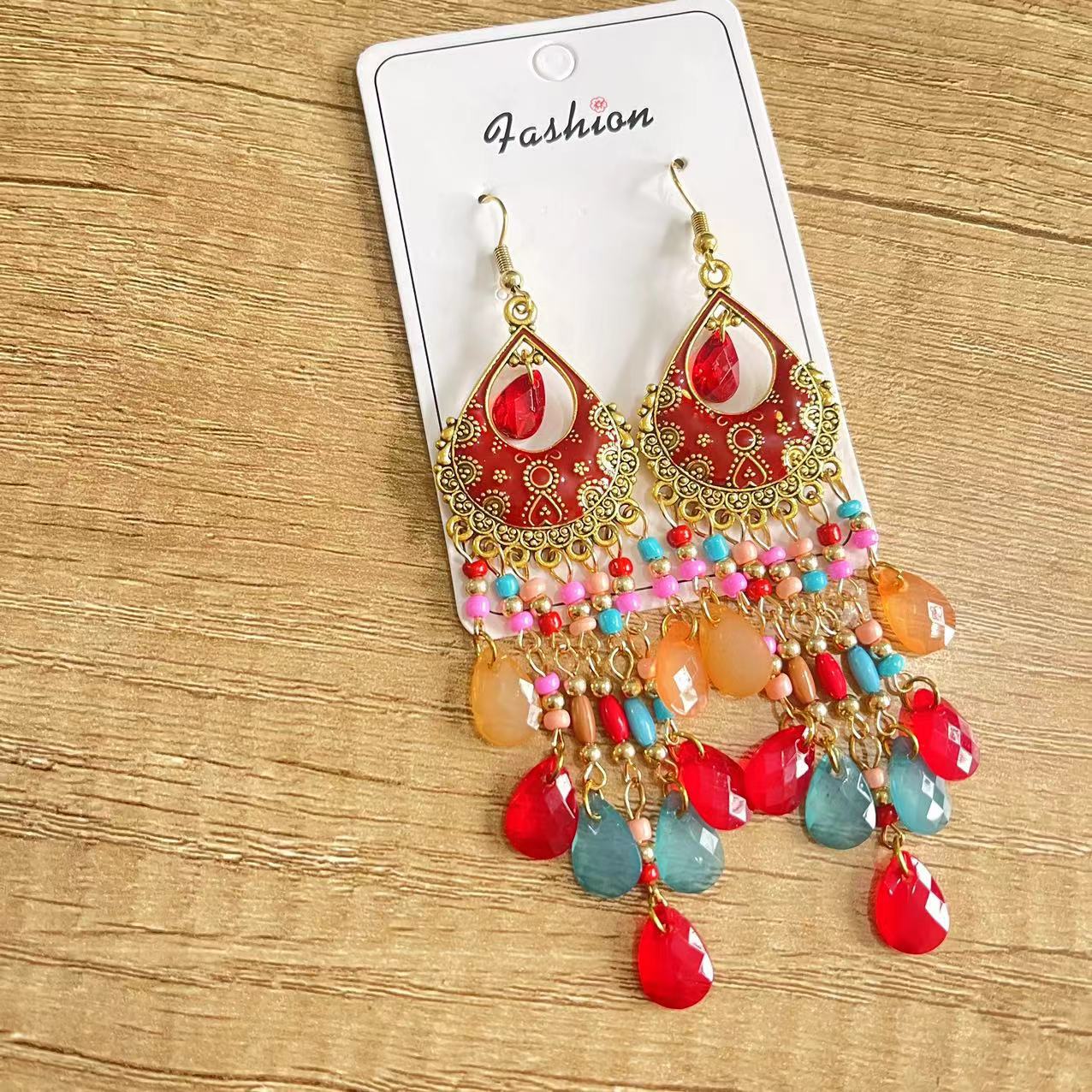small design earrings drop-shaped with tassels