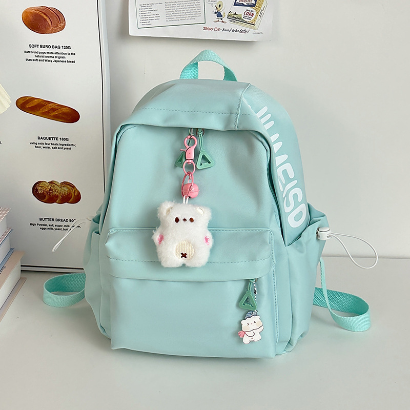 Mochila de gran capacidad para estudiantes de secundaria femenina simple y versátil para estudiantes de secundaria japonesa mochila de diseño