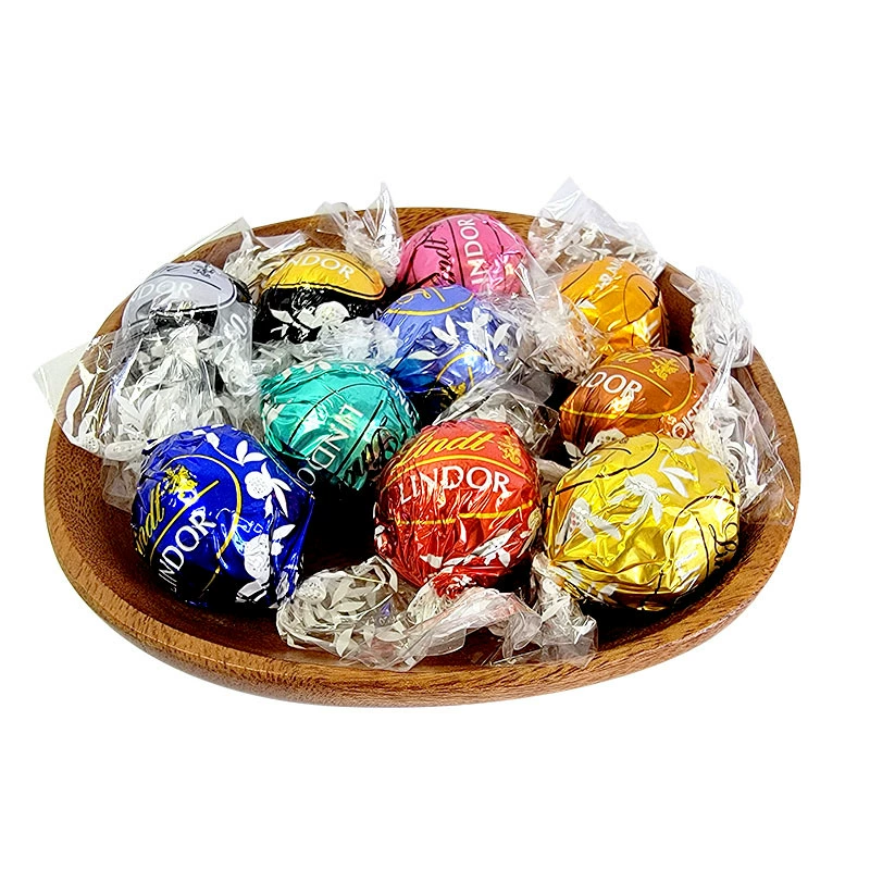 Шоколад молочный Lindt Soft Heart Imported Black Clever White Clever Caramel оптом 12.5 г за штуку
