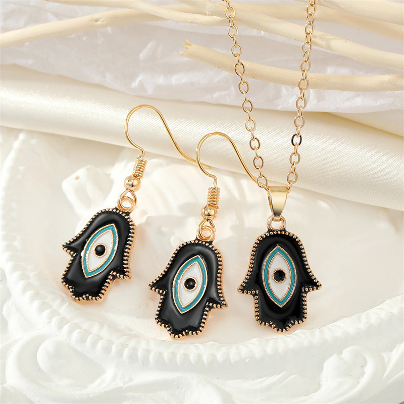 Retro Alloy Black Devil Eyes Palm Earrings Necklace Set