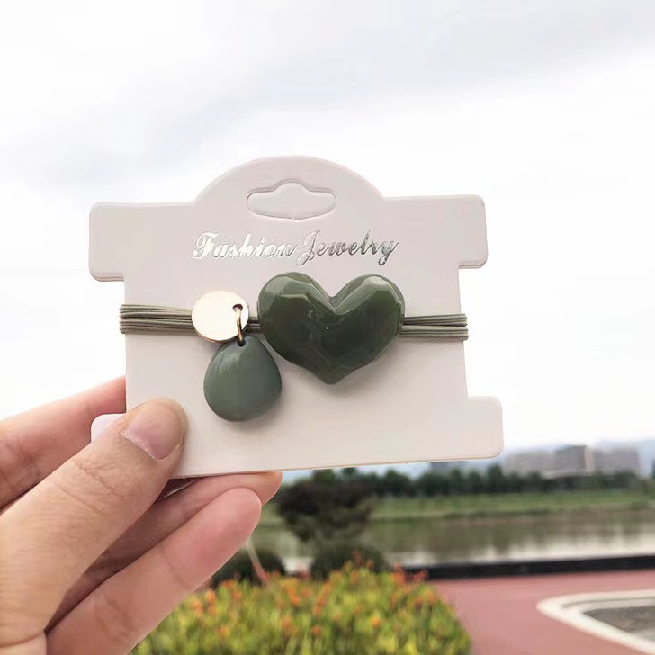 Elástico joyas de cabello de moda con frijoles frescos M anillo de cereza cuerda de cabello al por mayor de la banda de goma cabeza de 100 bolas de cabello rojo una variedad de alta elástica