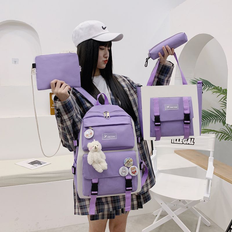 New Korean version with stylish large capacity Oxford cloth multi-purpose four piece backpack for primary, secondary,_voghion.com