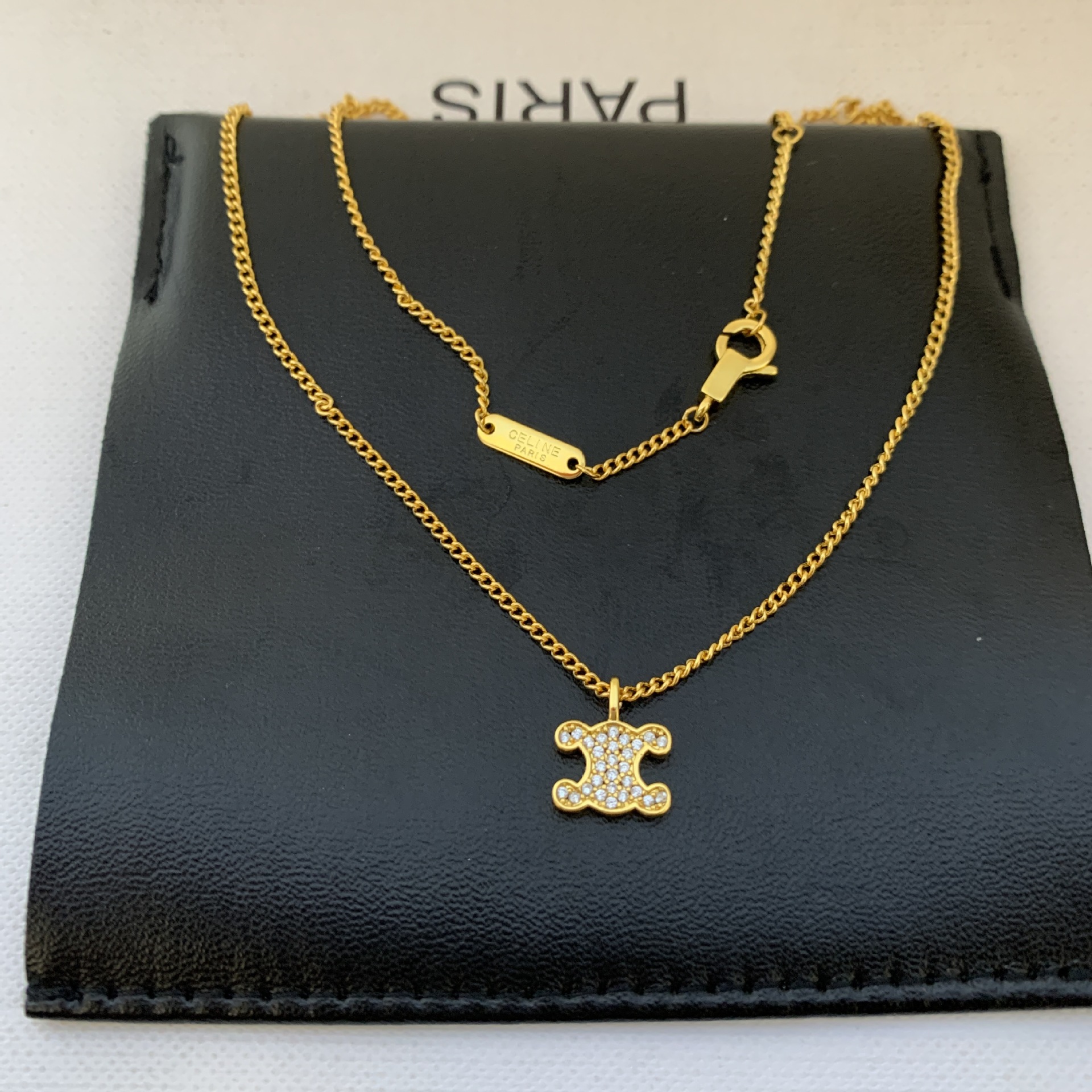 Golden necklace, diamond encrusted