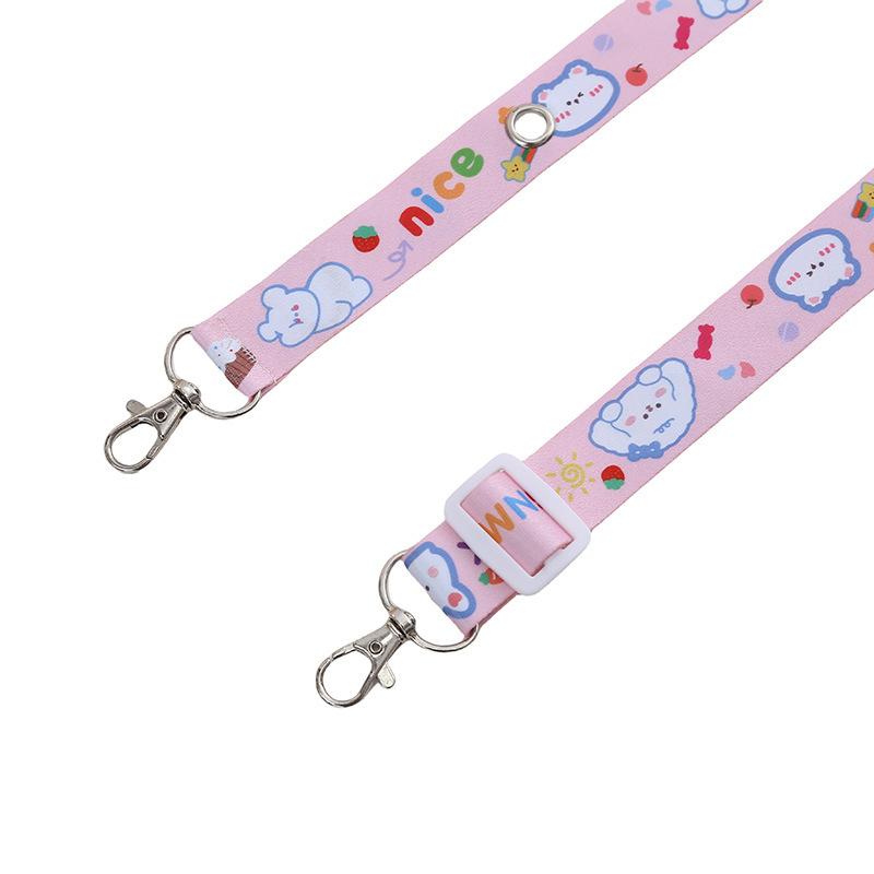 ぬいぐるみのストラップと子供機のストラップを掛けます。|undefined