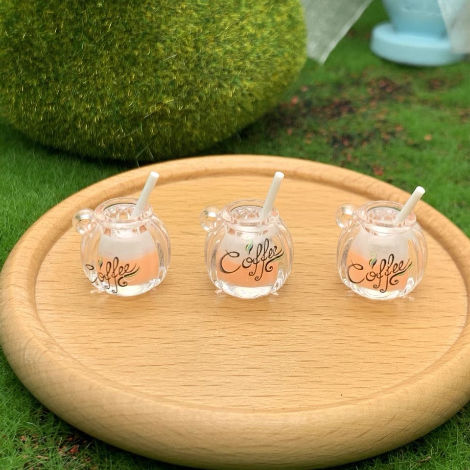 Suministro directo de fábrica de dos colores taza de café luminosa DIY accesorios para el cabello llavero mochila colgante material al por mayor diadema hecha a mano