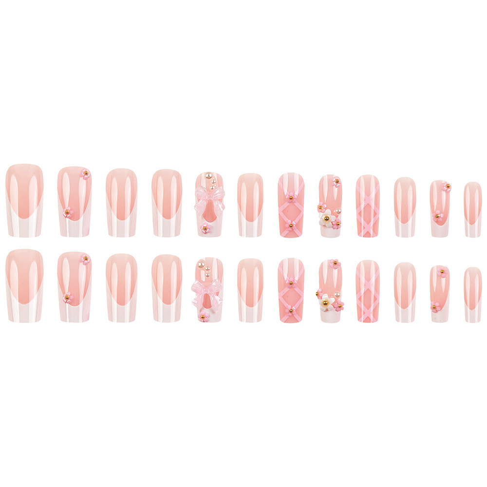Polvo de diamante blanco arco ballet manicure flores de venta caliente transfronteriza francesa 24 piezas de parche de uñas