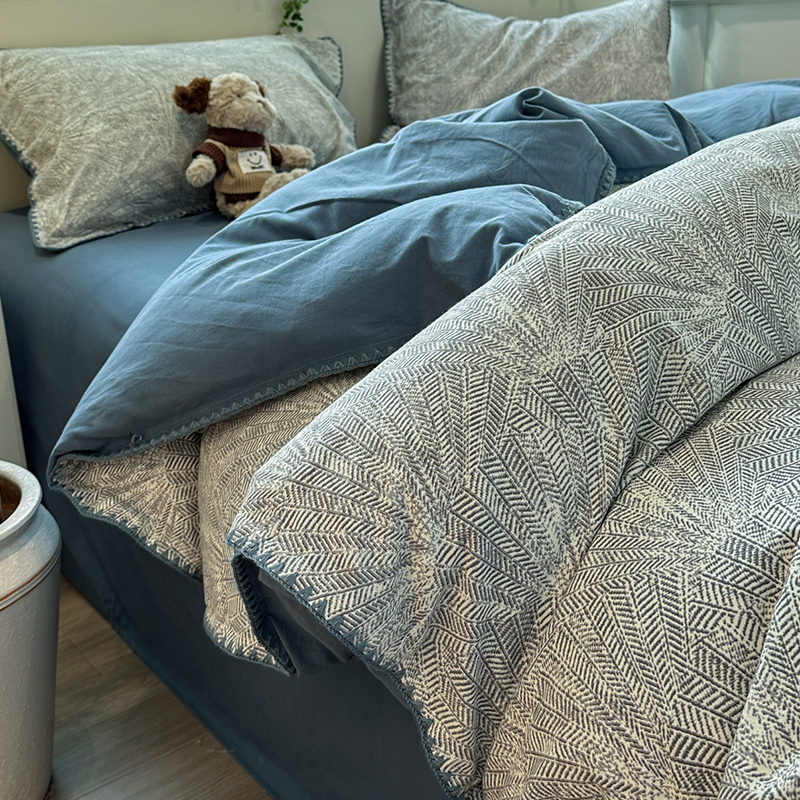 A clase de agujas de rayas grises primavera y otoño molido cuatro piezas de invierno engrosado sábanas de algodón