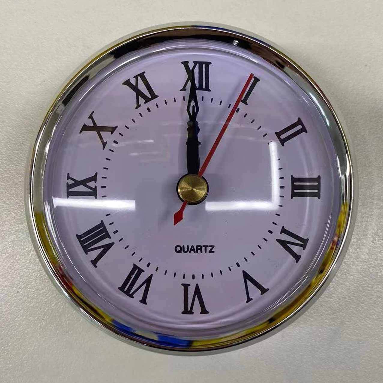 Amazon venta caliente reloj de cristal 80mm colmillos insertables artesanía con incrustaciones de reloj de cuarzo núcleo de reloj