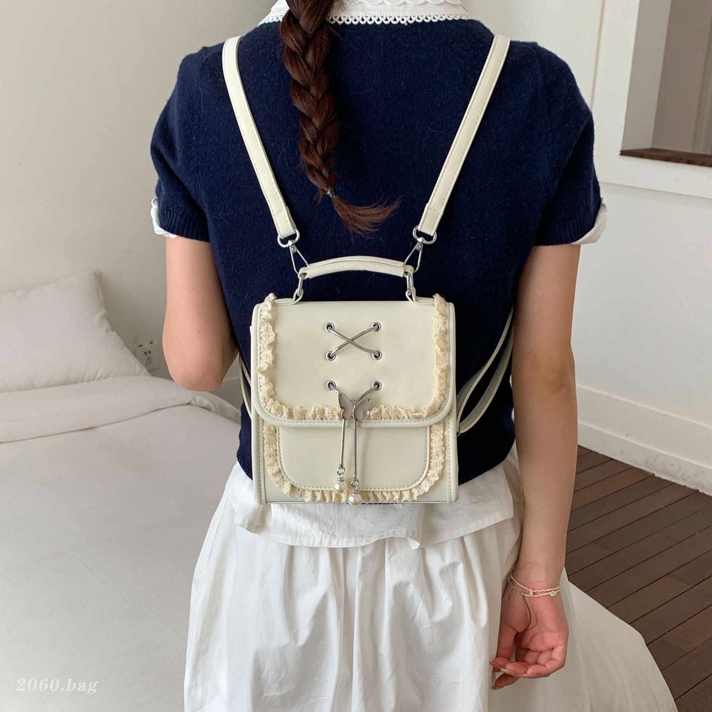 Mochila universitaria diaria versátil temperamento nuevo tipo bolso plegable sensación de mujer 2026 mochila de viaje