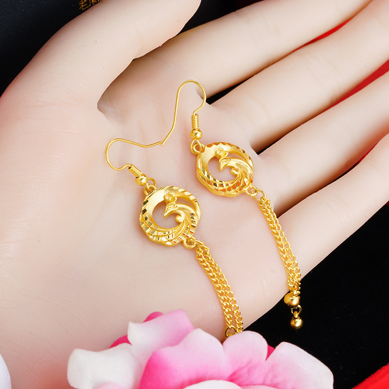 Arena oro gotas para los oídos de las mujeres Phoenix tallado borla pendientes no se desvanece temperamento estilo nacional Phoenix largo retro joyería