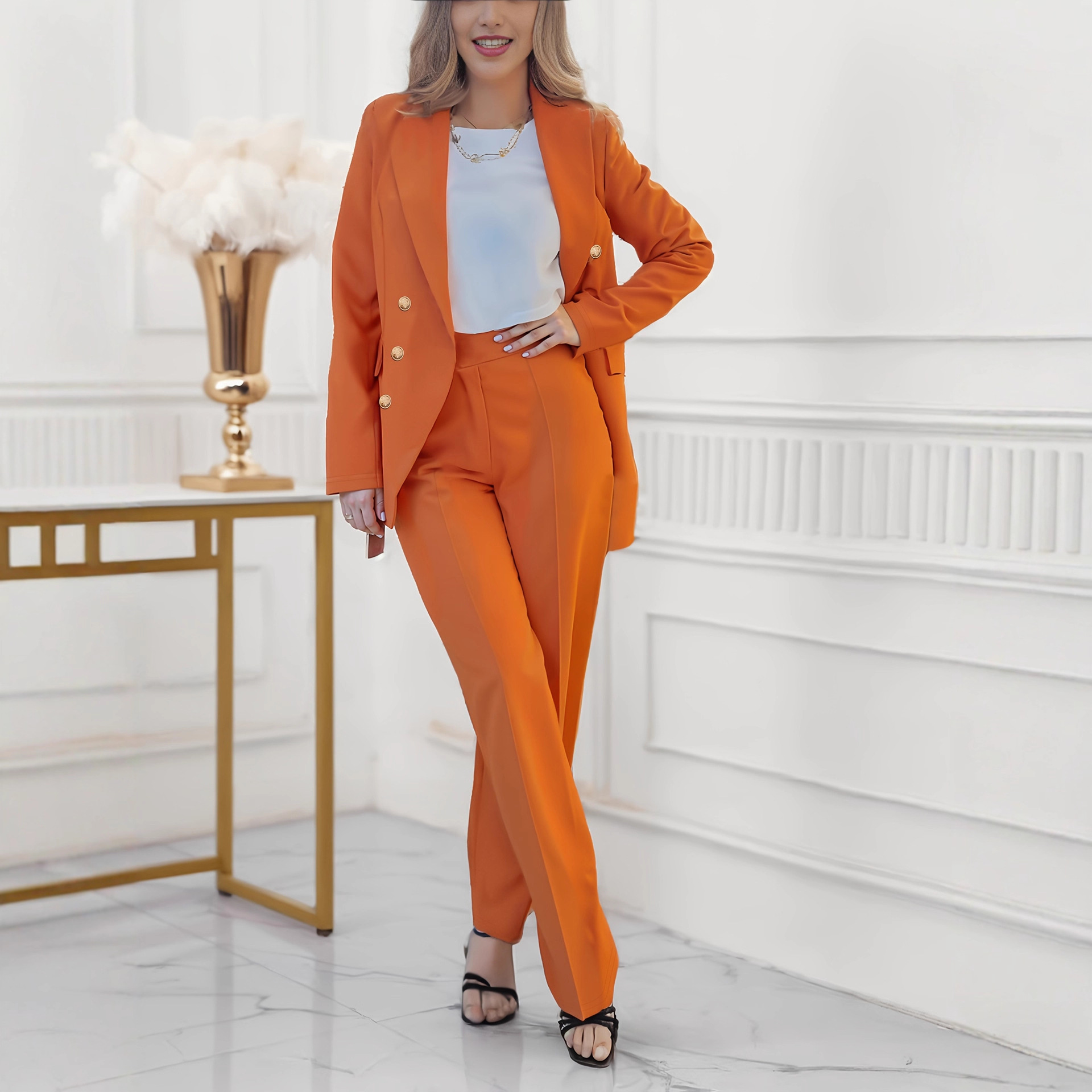 Dameskleding: effen blazer met knoopsluiting, hoge taille, flatterende broek, formele pakset_voghion.com