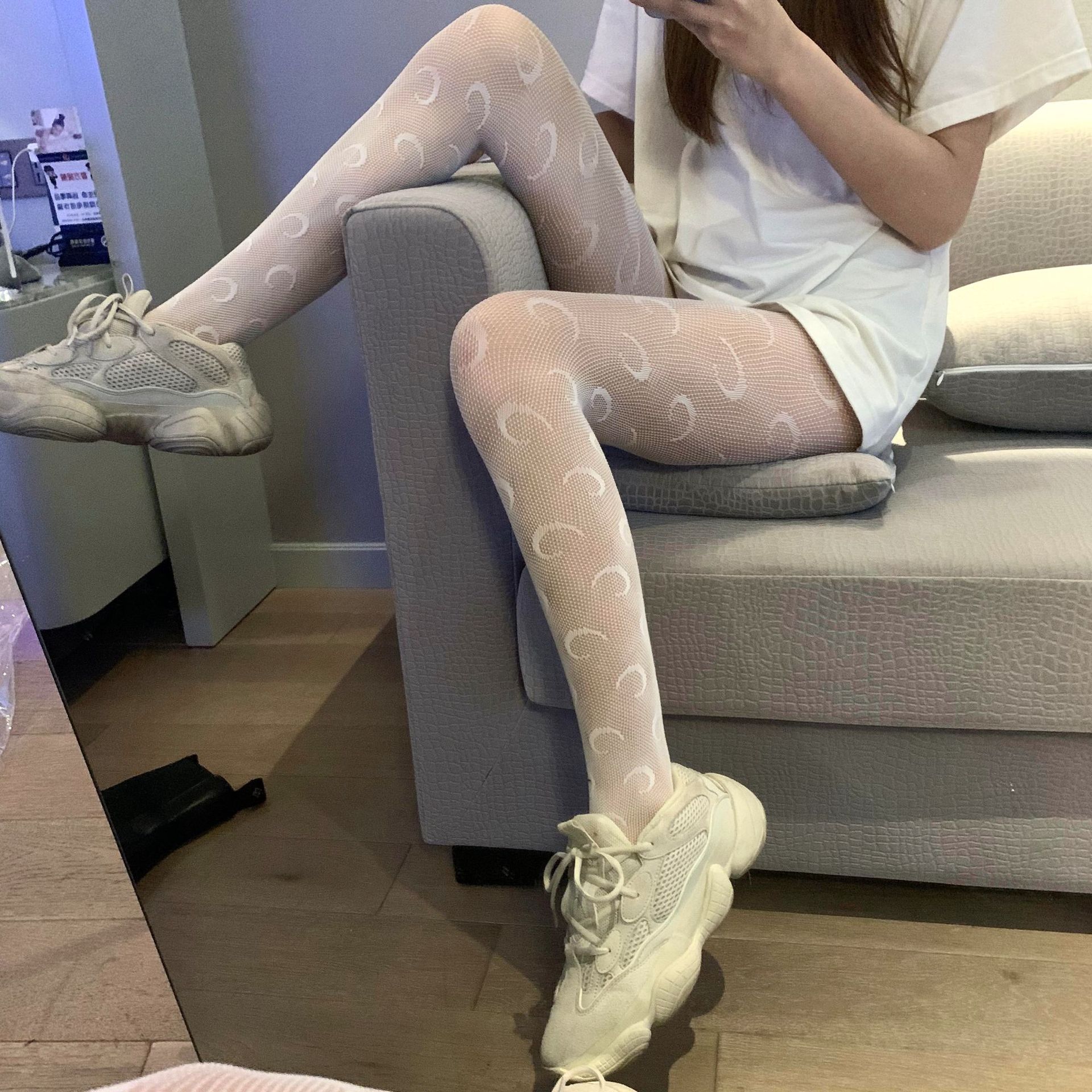 Fábrica en stock al por mayor de malla sexy JK medias negras transfronterizo Comercio exterior blanco Luna doble G pantimedias calcetines de red