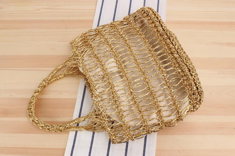 Women's Medium Plastic Paper Solid Color Beach Classic Style Weave Hollow String Beach Bag display picture 7