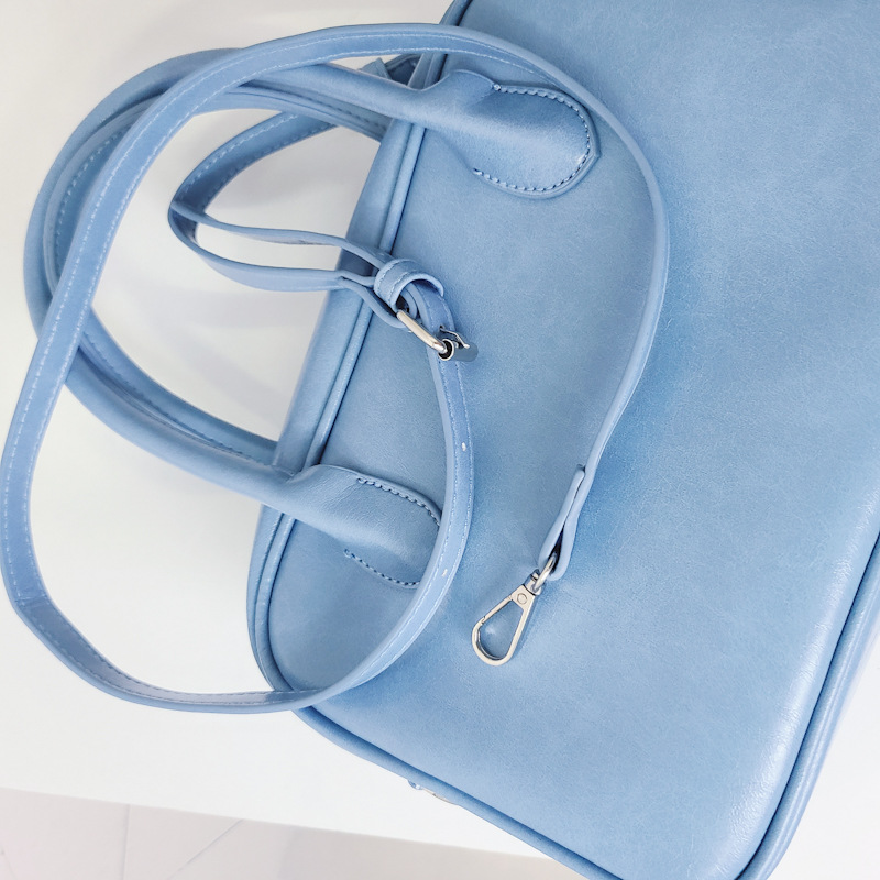 Design di nicchia coreano con la stessa borsa color crema e una borsa elegante, borsa quadrata con croce diagonale a spalla singola_voghion.com