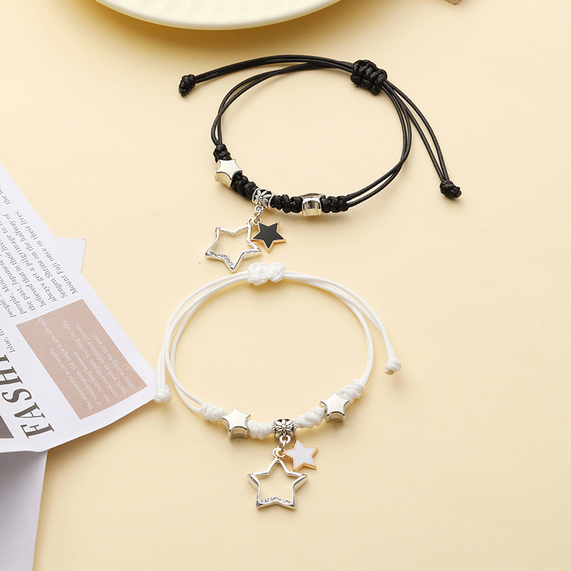 Pulsera pareja corazón hueco trenzada ajustable blanco negro_voghion.com