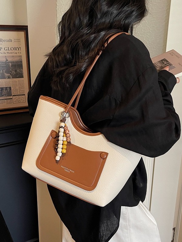 Bolsa de alta calidad retro de gran capacidad para mujeres 2026 nuevo paquete de textura ligera de lujo brazo de viaje ocio bolsa de mano image 1