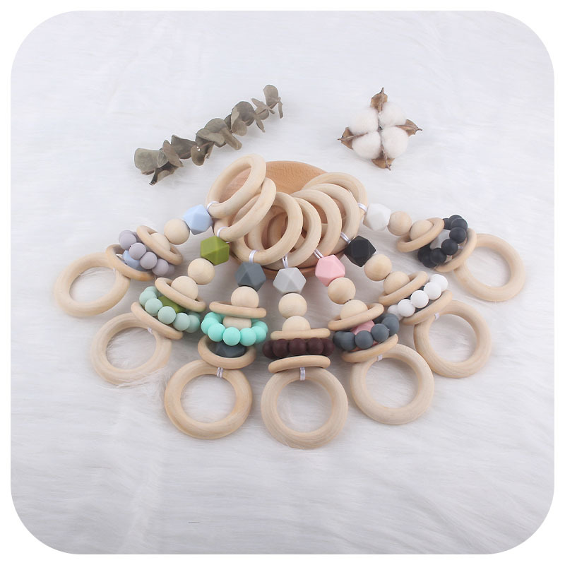 Mordedor creativo de juguete para niños nuevos Anillo Hemu bebé sonajero de mano ejercicio interactivo juguete de fortalecimiento dental palo de molienda