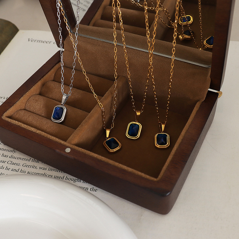 Europa y América titanio acero plateado 18K oro real Luz de lujo con incrustaciones cristal azul colgante collar hecho a mano cadena la clavícula joyería para las mujeres