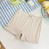 Trousers with bow, flesh color