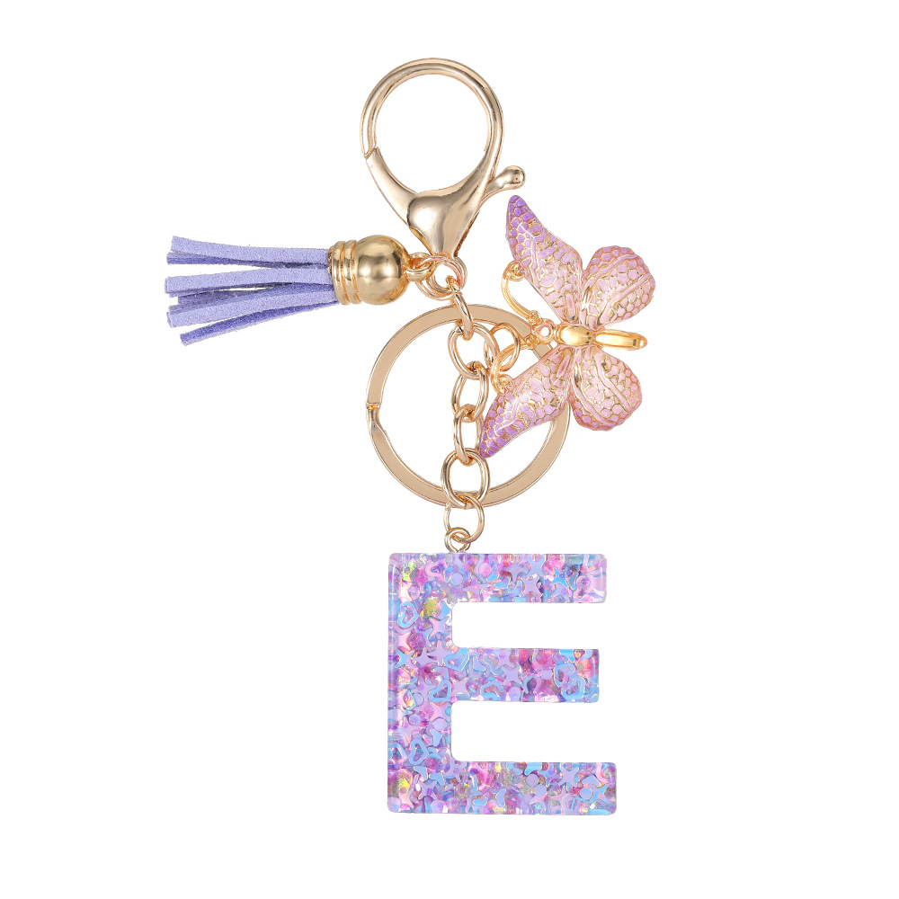 Mayorista transfronterizo mariposa esquinilla iniciales llavero de cristal goteo llavero de letras bolsos colgante