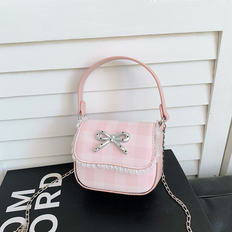 Bolsas de niños al por mayor transfronterizas 2025 nueva moda niña pequeña mochila de hombro de la moda de la tendencia universal bolso de hombro de niña