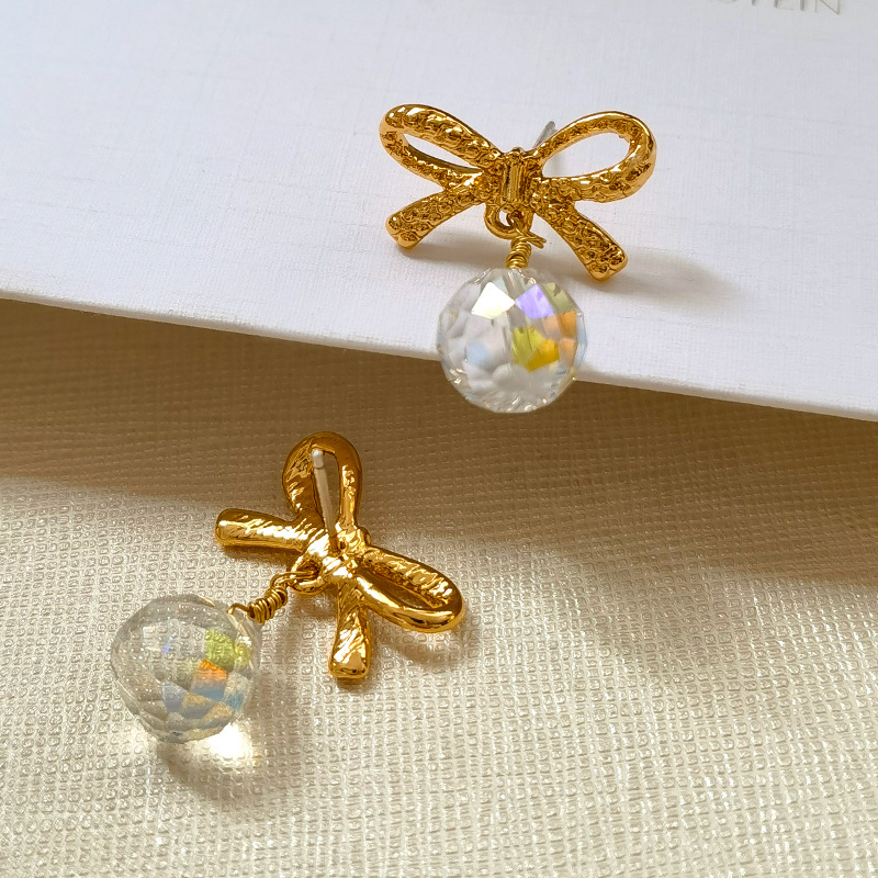 Copper earrings with bow drop-shaped