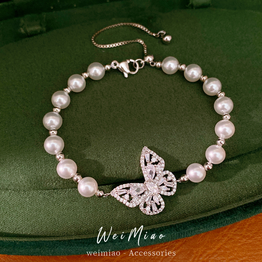Brazalete de perlas mariposa con cuentas de diamante ligero lujo nicho pulsera de alta sensación temperamento exquisito joyería diaria universal
