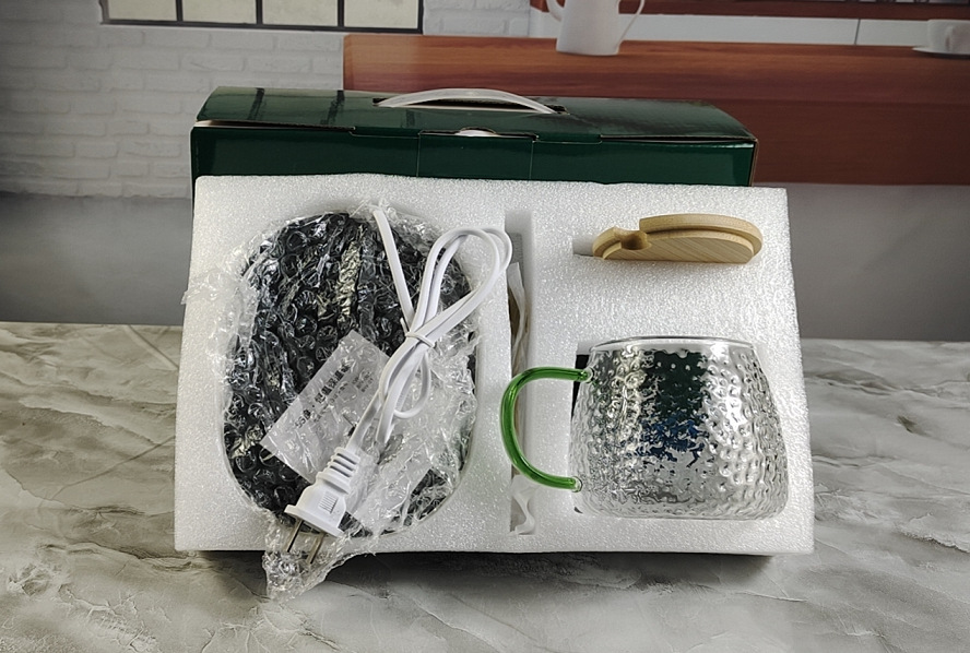 Vidrio taza caliente color en caja resistente al calor a prueba de explosiones aislamiento térmico calefacción posavasos alto valor de color 55 grados fábrica en stock taza de temperatura constante