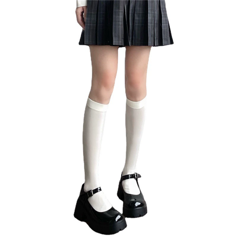 Summer high high boots, thin black tights, mid-length