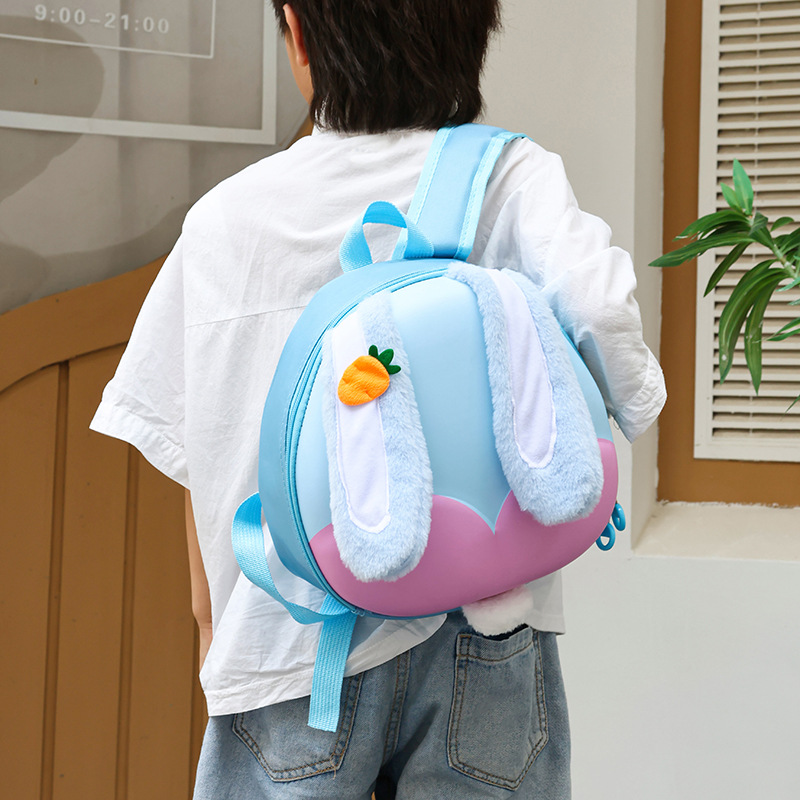 Jardín de infantes niños mochila de dibujos animados bonitas orejas grandes conejo bebé mochila portátil de cáscara de huevo mochila para niños